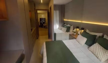 Apartamento smart quarto e sala e 2 quartos com suite vista mar pé na areia em Itapuã para venda