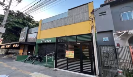 Sala casa comercial para locação na Barra frente de rua grande com 3 garagens