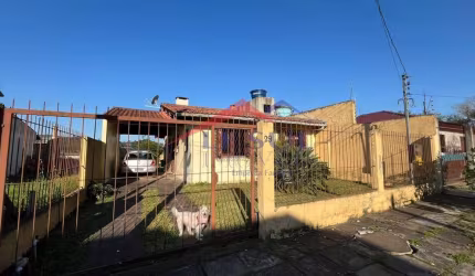 Casa com 2 quartos à venda na Rua Tenente Isolino Segobia, 29, Vila Nova, Porto Alegre por R$ 380.000
