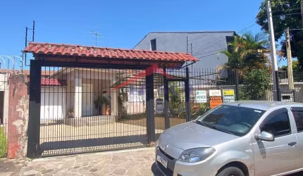 Casa com 4 quartos à venda na Rua Afonso Arinos, 909, Camaquã, Porto Alegre por R$ 590.000