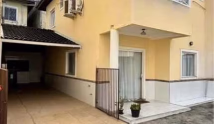 Casa em condomínio fechado com 3 quartos à venda no Ipitanga, Lauro de Freitas  por R$ 540.000