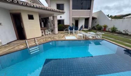 Casa em condomínio fechado com 3 quartos à venda no Buraquinho, Lauro de Freitas  por R$ 1.700.000