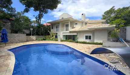 Casa em condomínio fechado com 4 quartos à venda na Estrada Haroldo Soares Glavan, 2064, Cacupé, Florianópolis por R$ 3.900.000