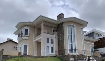 Casa em condomínio fechado com 4 quartos à venda na Estrada Haroldo Soares Glavan, 1760, Cacupé, Florianópolis por R$ 6.300.000