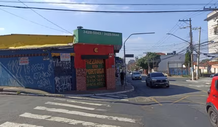 Terreno com salão e casa antiga a venda