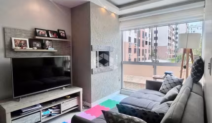 Apartamento com dois quartos, churrasqueira e vaga, no Sarandi