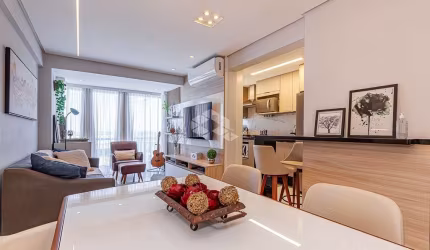 Apartamento com três quartos, duas vagas e churrasqueira