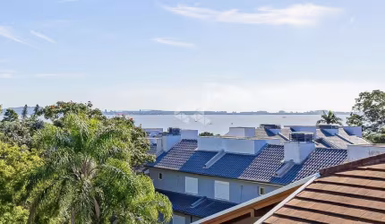 CASA EM CONDOMÍNIO COM VISTA PARA O GUAIBA