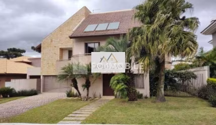 Casa em condomínio fechado com 4 dormitórios sendo 2suítes em Pinhas/PR