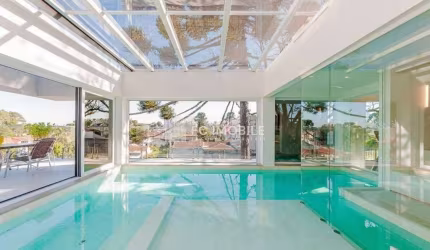 Casa em condomínio com 632 m² privativos e 4 suítes, à venda no Campo Comprido - Curitiba/PR