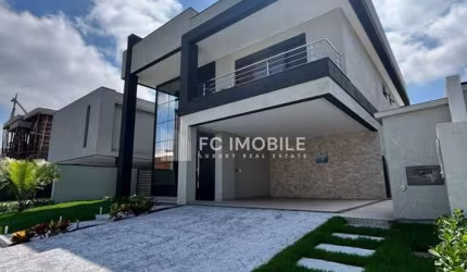 Casa com 305 m² privativos, 4 suítes, à venda no condomínio clube Caledônia em Camboriú/SC