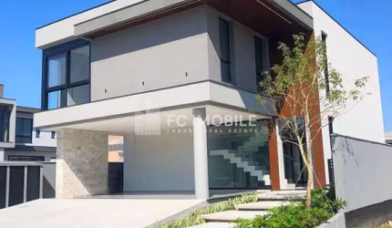 Casa com 386 m² privativos, 4 suítes, à venda no condomínio clube Caledônia em Camboriu/SC