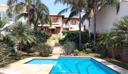 Casa Alto Padrão em condomínio dentro da cidade com 4 dormitórios Piscina Lago 2 áreas gourmets
