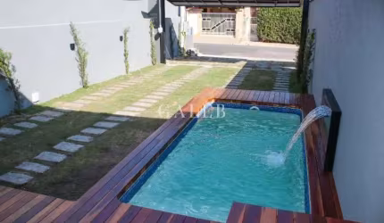Casa térrea à venda com 3 suítes, piscina, quintal com gramado