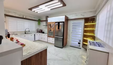 CASA TÉRREA DE ALTO PADRÃO 4 SUITES EM BAIRRO SEGURO E TRANQUILO