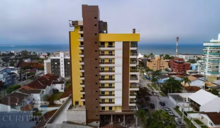Apartamento com 3 suítes, 2 vagas, 154 m² privativos à venda por R$ 2.200.000 - Centro - Guaratuba/PR