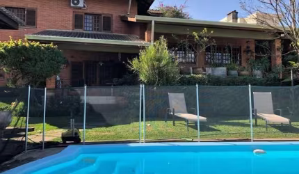 Casa em condomínio fechado com 9 quartos à venda na Rua Argentina, 201, Recanto Impla, Carapicuíba por R$ 1.800.000