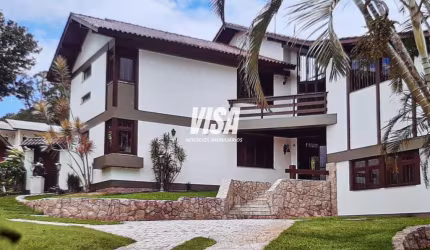Casa em condomínio fechado com 4 quartos à venda na Rodovia Haroldo Soares Glavan, 1900, Cacupé, Florianópolis por R$ 2.900.000