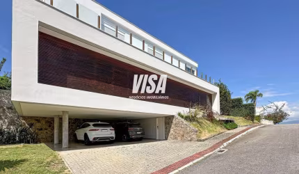Casa em condomínio fechado com 4 quartos à venda na Rodovia Haroldo Soares Glavan, 3950, Cacupé, Florianópolis por R$ 7.980.000
