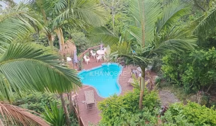 Casa em condomínio fechado com 3 quartos para alugar na Rodovia Jornalista Manoel de Menezes, 361, Lagoa da Conceição, Florianópolis por R$ 16.500