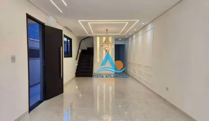 Sobrado com 4 dormitórios à venda, 160 m² por R$ 1.190.000,00 - Vila Guilhermina - Praia Grande/SP