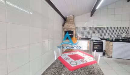 Casa com 2 dormitórios à venda, 115 m² por R$ 590.000,00 - Maracanã - Praia Grande/SP