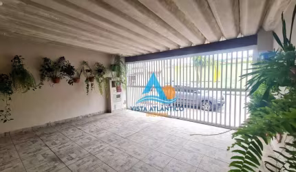Casa com 3 dormitórios à venda, 195 m² por R$ 695.000,00 - Tupi - Praia Grande/SP