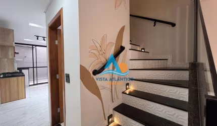 Casa com 2 dormitórios à venda, 90 m² por R$ 600.000,00 - Caiçara - Praia Grande/SP