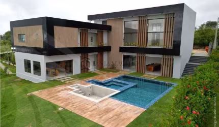 Casa à venda em lote de 800m², sendo 420m² área construída, 6 quartos (sendo os 6 suítes), 3 Wc soc