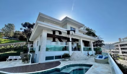 Casa em condomínio fechado com 5 quartos para alugar na Rodovia Haroldo Soares Glavan, 910, Cacupé, Florianópolis por R$ 22.000