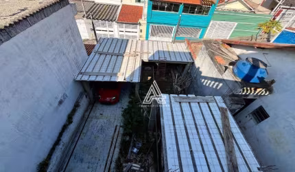 Terreno com casa incompleta para venda
