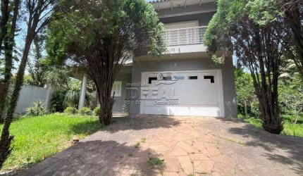 Casa com 3 quartos à venda no Centro, Nova Santa Rita  por R$ 870.000