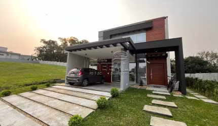 Casa em condomínio fechado com 3 quartos à venda no Sanga Funda, Nova Santa Rita  por R$ 1.800.000
