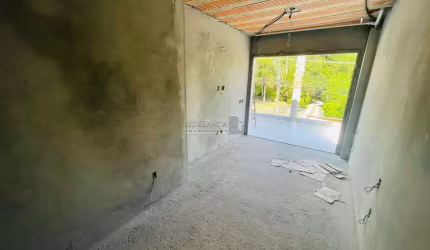 Casa em condomínio fechado com 3 quartos à venda na Estrada Haroldo Soares Glavan, --, Cacupé, Florianópolis por R$ 2.390.000