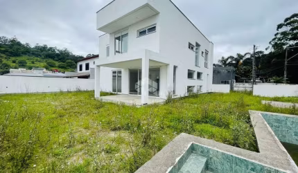 Casa em condomínio fechado na Cachoeira do Bom Jesus 5 dorm