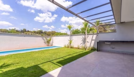 CASA EM CONDOMÍNIO 424.0M² ÁREA PRIVATIVA,  4 SUÍTES  4 GARAGEM- QUINTAL COM PISCINA