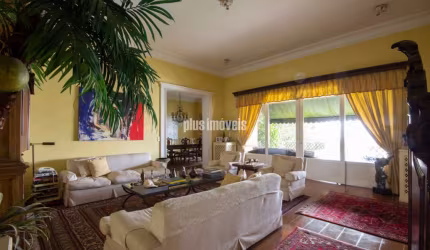 Cidade Jardim 508,0m² Área de Terreno, 410,0m²AC  4 Suítes 4 Gar