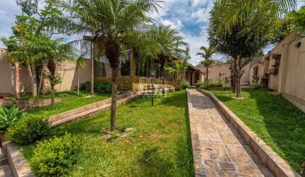 Excelente Casa térrea no Xaxim com amplo quintal e 4 quartos