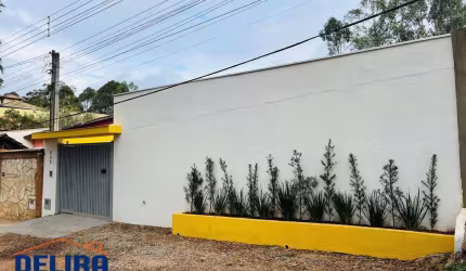 Casa à venda em Terra Preta, apta para Financiamento bancário.