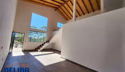 Casa em condomínio com área total de 150 m² sendo 115 m² construídos