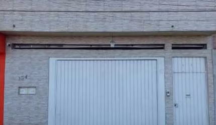 Sobrado com Duas Casas e Churrasqueira:  Conforto em um Único espaço