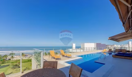 Exclusiva cobertura penthouse pé na areia - Condomínio Riviera de São Lourenço.