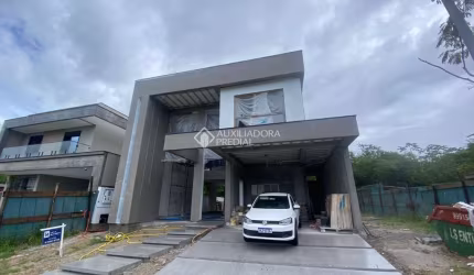 Casa em condomínio fechado com 3 quartos à venda na Rua Lagoinha, 65, Pedra Branca, Palhoça, 298 m2 por R$ 3.840.000