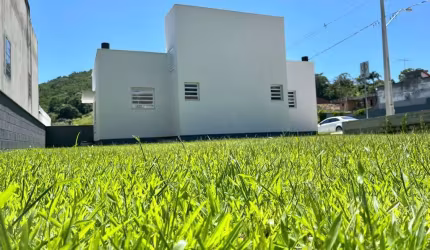 Terreno em condomínio fechado à venda na Rua Homero de Miranda Gomes, 1411, Fundos, Biguaçu, 150 m2 por R$ 180.000