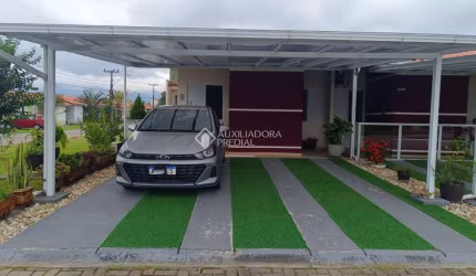 Casa em condomínio fechado com 4 quartos à venda na Avenida Paulo Roberto Vidal, 1455, Bela Vista, Palhoça, 83 m2 por R$ 617.000