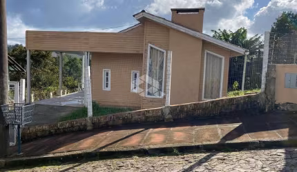 Casa com 3 dormitórios  localizada em área central