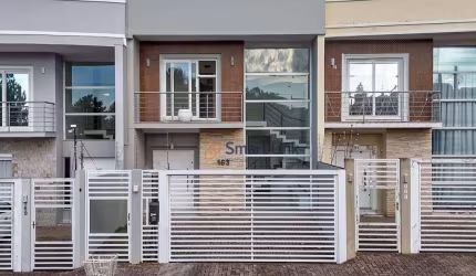 Sobrado com 3 dormitórios à venda, 113 m² por R$ 697.000,00 - Estância Velha - Canoas/RS
