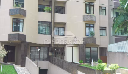 Apartamento de 1 quarto, sacada, 74,96m2 privativos no Bacacheri, Rua Estados Unidos, Andar Alto, Garagem Individual Coberta e Livre