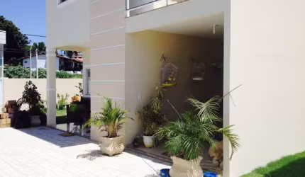 Casa com 3 dormitórios à venda, 130 m² por R$ 450.000 - Parque Hotel - Araruama/RJ
