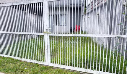 Casa espaçosa com quintal nos fundos